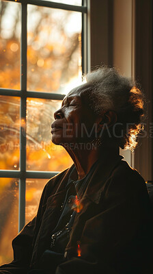 Meditate, elderly African and woman with plants. Senior, retirement and spiritual health in room with large window. Thinking, thoughtful and praying in sunset for worship and lifestyle concept