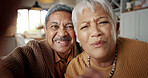 Face, video call or senior couple in living room talking on digital connection, virtual app or social media. Happy man, mature woman or people speaking online in selfie at home in retirement together