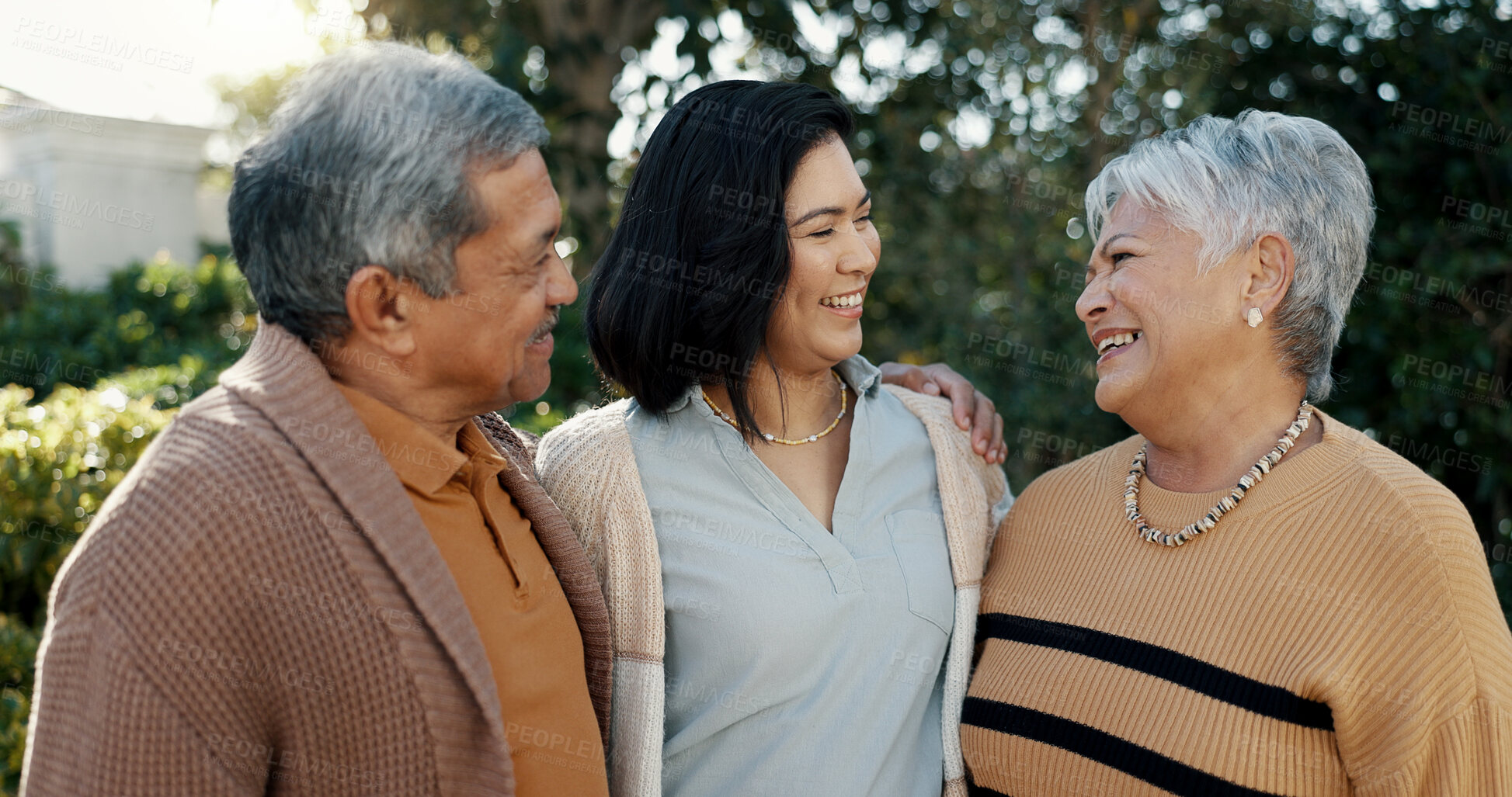 Buy stock photo Woman, laughing or senior parents hug for bonding, support or love in backyard of a family house. Old man, funny or mature mom with a happy daughter in outdoor porch together on holiday vacation