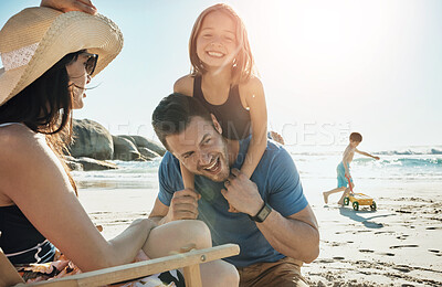 Buy stock photo Parents, children and playful at beach, vacation and piggy back in summer, portrait and happy for bonding. Father, mother and kids with family, holiday and care with love in sunshine by sea in Miami