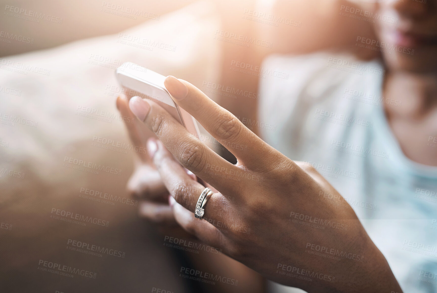 Buy stock photo Relax, hands or woman typing on a phone for social media, searching content or notification at home. Closeup, browsing website or person posting, chatting or texting on online networking mobile app 