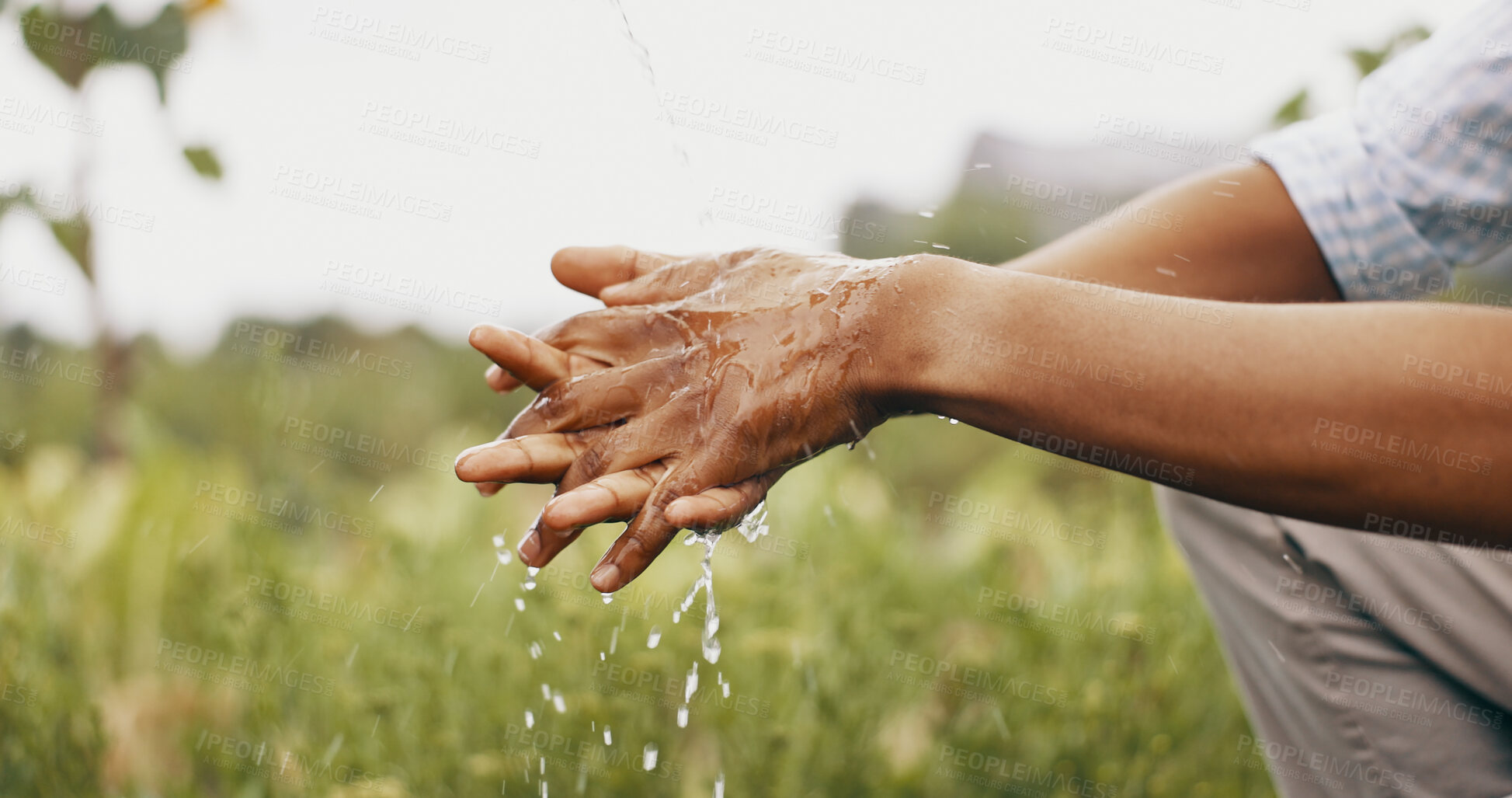 Buy stock photo Hands, cleaning and water or outdoor for hygiene bacteria or wellness splash, forest or dirt. Person, fingers and liquid drops in nature or washing for germ protection or eco friendly, wet or hydrate