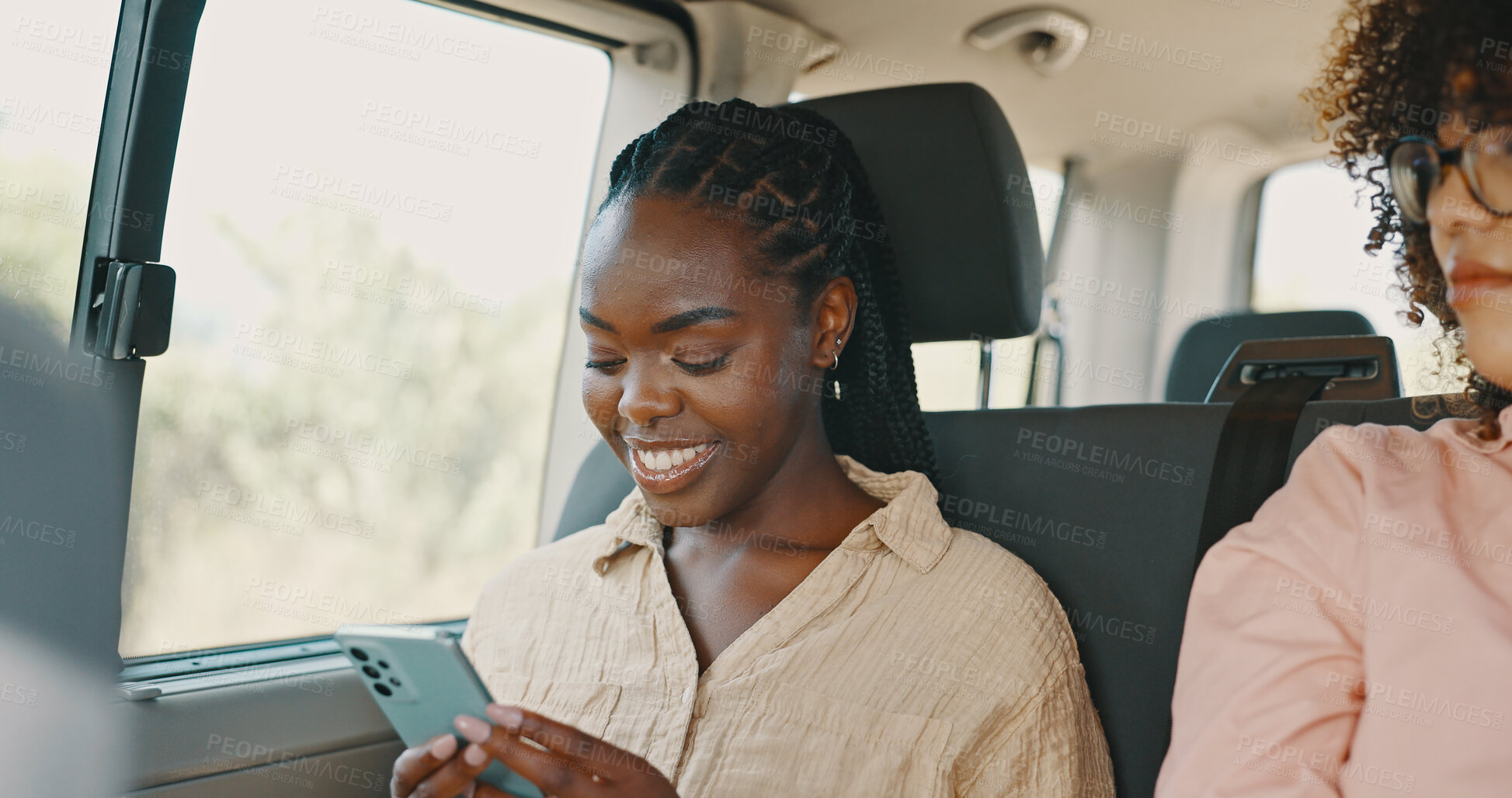 Buy stock photo Road trip, woman and texting on vacation in car, smartphone and online communication or chat. Black female person, vehicle and scrolling on social media, holiday and adventure or conversation on tech