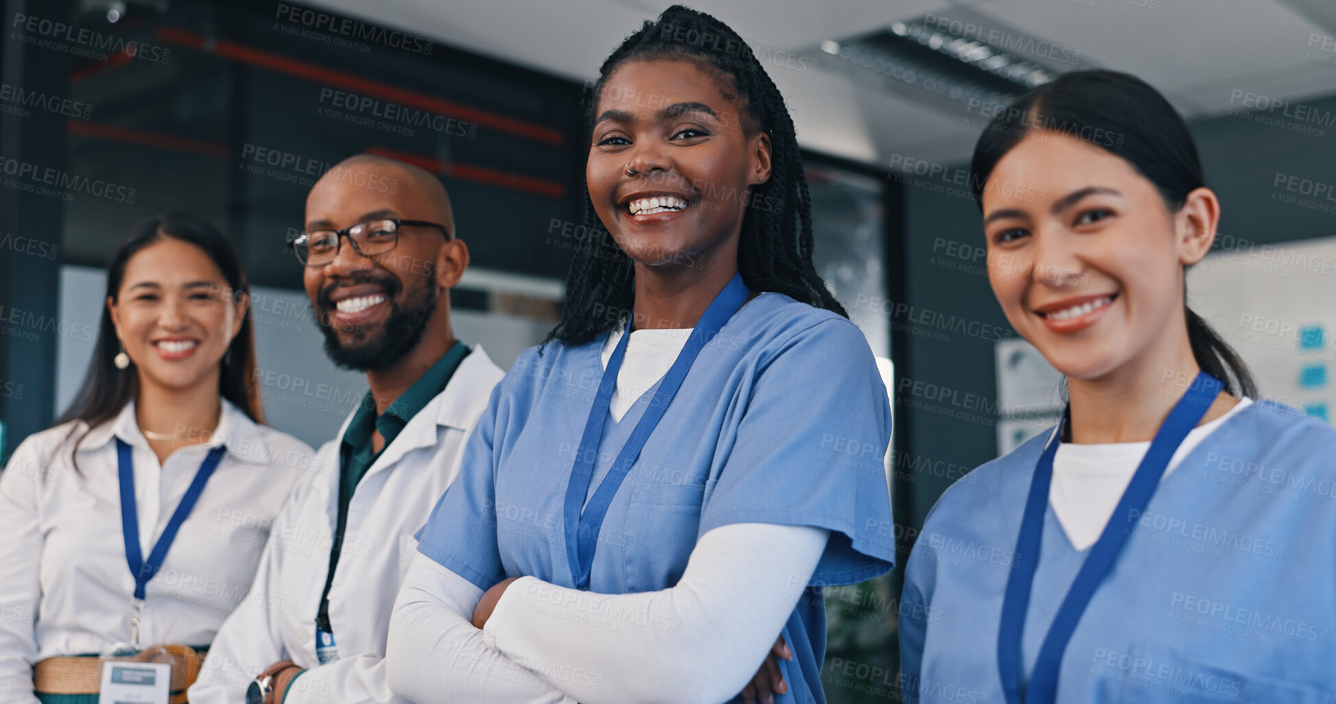 Buy stock photo Doctors, group and happy with arms crossed in hospital with confidence in medical nurse or mission. Healthcare, team and portrait of people in clinic working in medicare with pride and diversity