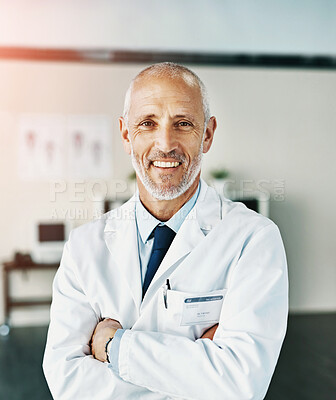 Buy stock photo Mature man, doctor and arms crossed with portrait in clinic, working in healthcare or medicine. Male person, happiness and confidence for wellness in medical hospital, employee with pride for health