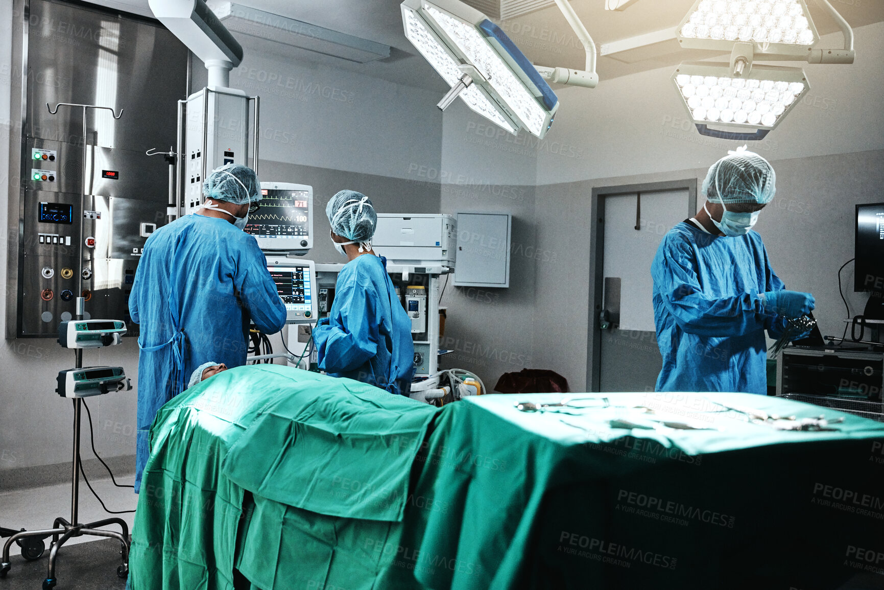 Buy stock photo Doctor, surgeon and employees in hospital, theater and emergency room busy in medical career. People, healthcare workers and nurses with patient for surgery, medicine and operation for health