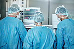 Surgery, group or surgeons with teamwork for emergency, accident or healthcare in hospital clinic. Heart rate monitor, back or doctors in surgical collaboration for operating, support or medical help