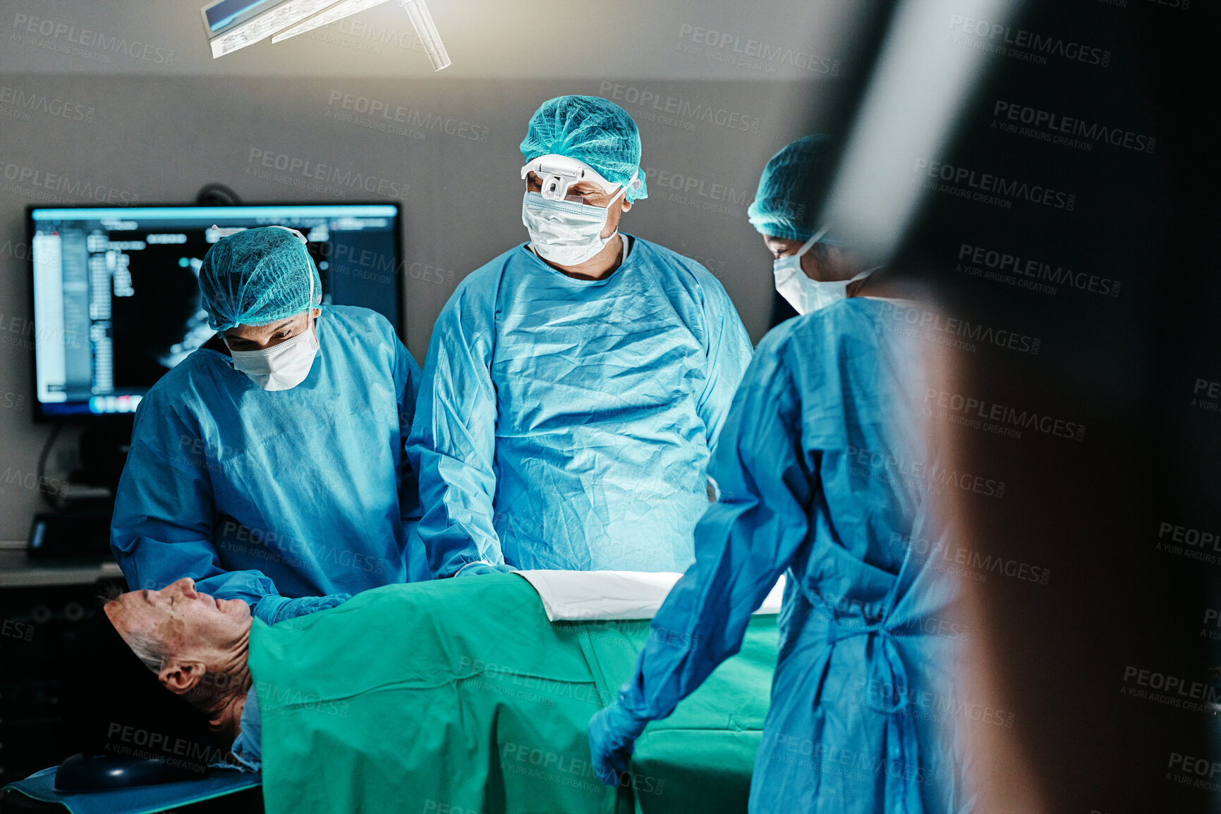 Buy stock photo Medical, surgery or doctors in operating room with theater patient or trauma unit for anatomy emergency. Healthcare, support and surgeon team consulting sick man at hospital with empathy and comfort