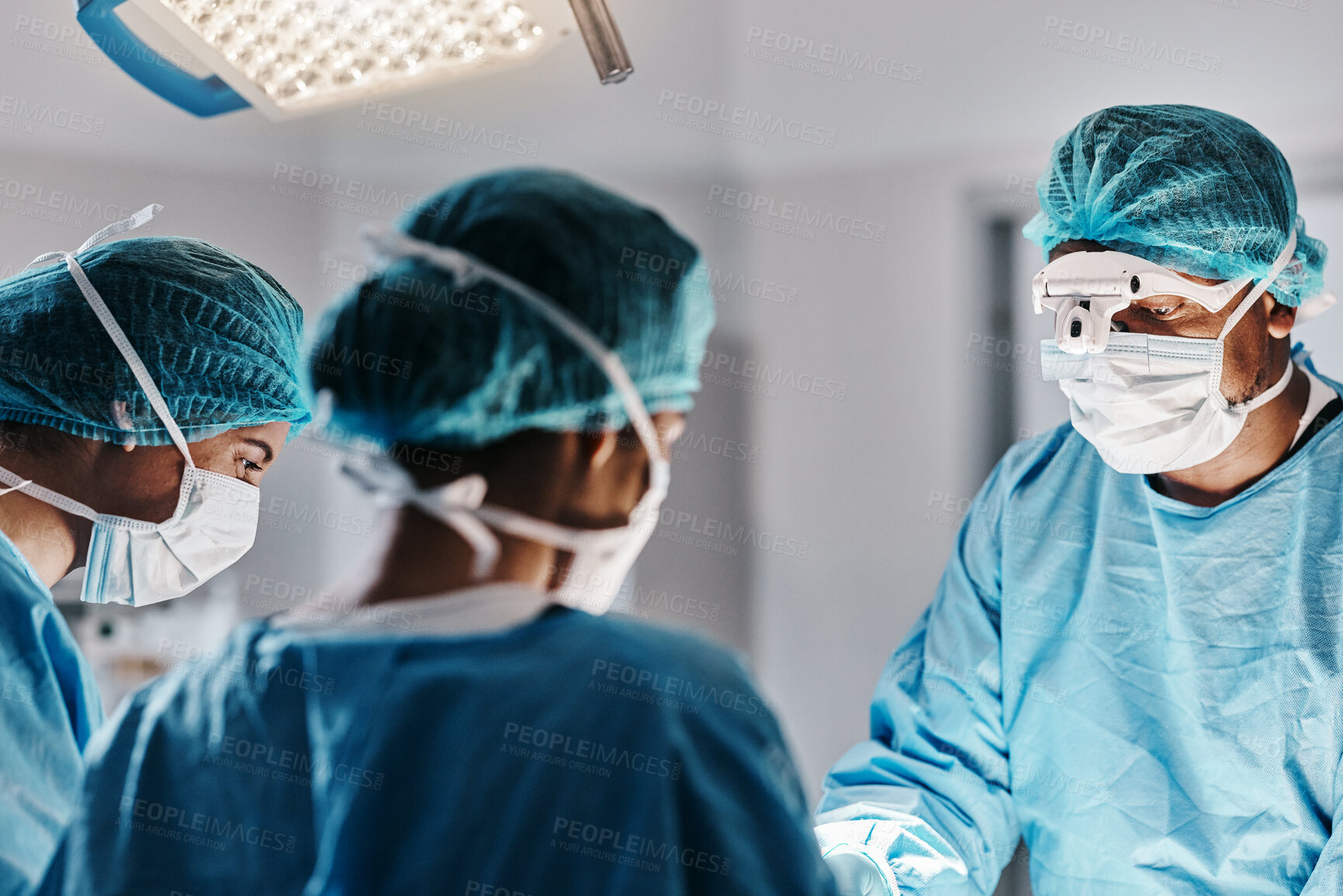 Buy stock photo Doctor, surgery and operating room with face mask for medical emergency, operation or hospital. People, teamwork and healthcare for accident wellness for healing procedure, collaboration or helping