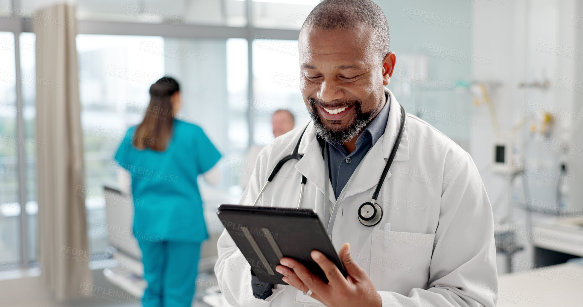 Buy stock photo Happy, typing and black man with a tablet, doctor and clinic with connection, email notification and research. African person, employee and medical professional with tech, healthcare and digital app
