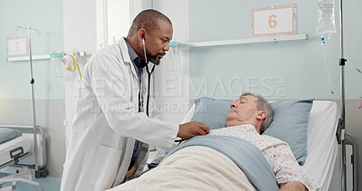 Consultation, healthcare and doctor with senior man in hospital after surgery, treatment or procedure. Discussion, checkup and African male medical worker talk to patient in clinic bed for diagnosis.