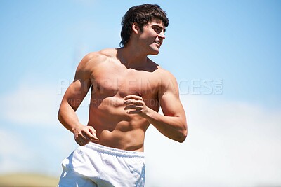 Buy stock photo Fitness, sports and man outdoor for running, training and sports, wellness or morning cardio on blue sky background. Health, exercise or topless guy runner outside with summer, freedom or workout run
