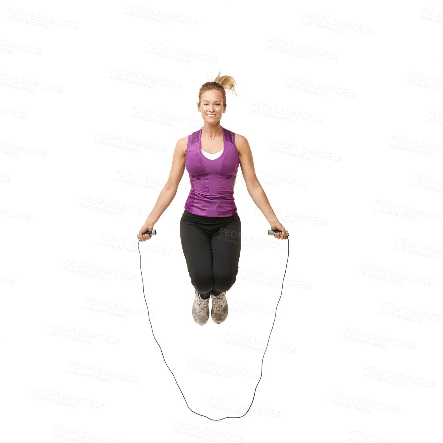 Buy stock photo Jump, skipping rope and portrait of woman on a white background for fitness, workout and training. Sports, happy and isolated person with gym equipment for health, wellness and exercise in studio