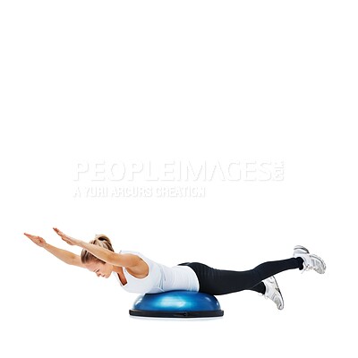 Buy stock photo Woman, fitness and balance on half ball for core training, muscle and workout isolated on white background. Exercise equipment, strength and endurance with mockup space and strong athlete in studio