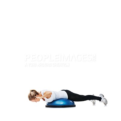 Buy stock photo Woman, ball and lying in balance for exercise, workout or fitness on a white studio background. Young active female person or athlete on half round object for health and wellness on mockup space