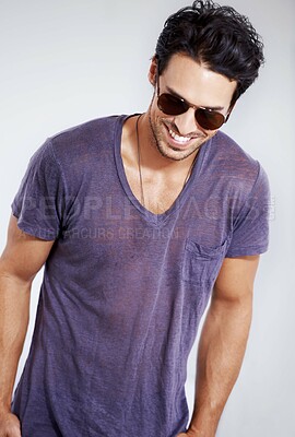 Buy stock photo Happy, man and fashion with sunglasses in studio with confidence in clothes, cool style and pride. Summer, holiday and person smile in casual outfit for vacation, break and relax on white background