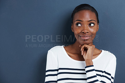 Buy stock photo Thinking, idea and black woman with mockup in studio for planning, questions or asking on blue background. Why, curious and African female model with emoji guess for problem solving or brainstorming 