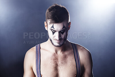 Buy stock photo Man, mime and topless for theatre performance with dark background with light for stage, creativity and entertainment. Portrait, circus or magician performer and face paint with tattoo for show