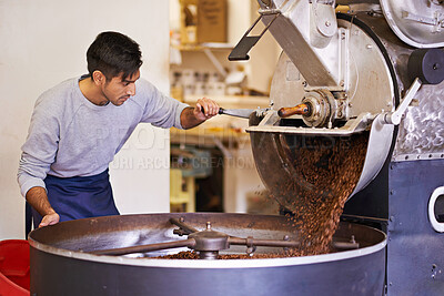 Buy stock photo Coffee, cafe and man with machine for roasting with blending, production and quality control. Entrepreneur, barista or roaster with beans at small business, sustainable startup and espresso process