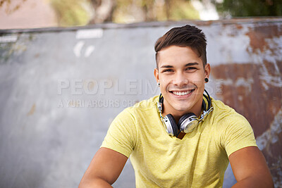 Buy stock photo Smile, gen z and portrait of man at skatepark for skating practice or training for competition. Happy, fun and face of cool male person sitting on ramp with positive, good and confident attitude.