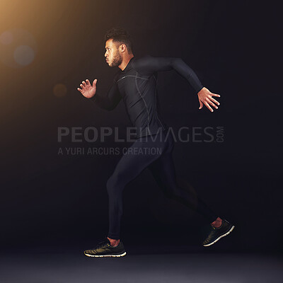 Buy stock photo Running, fitness and man with workout, exercise and training on a black studio background. Person, mockup space and model with breathing and runner with cardio and athlete with confidence or wellness