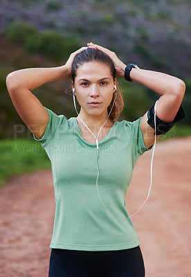 Buy stock photo Fitness, portrait and woman tired on run and breathing to rest with music in headphones in exercise or workout. Athlete, break and girl training in summer with resilience for challenge in countryside