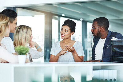 Buy stock photo Diverse, listening and smiling businesspeople in meeting talking, discussing and planning work schedule in modern workplace. Team leader having staff discussion about project plan and job management