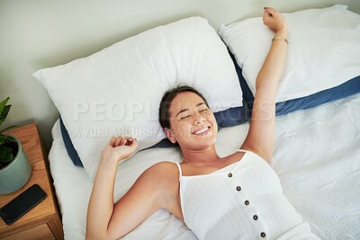 Buy stock photo Morning, stretching and woman wake up in bed on holiday or relax vacation with happiness from sleep. Healthy, rest and Asian girl ready to start weekend with peace and wellness above home or hotel