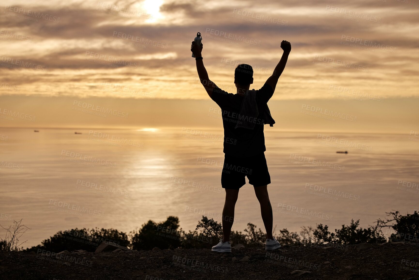 Buy stock photo Celebration, victory and athlete on hill, outdoor and nature of park, excited and happy for success. Fitness, energy and workout for person, morning and silhouette of runner, healthy and exercise