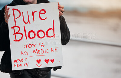 Buy stock photo Person, poster and protest in street for vaccine, covid and opinion with sign, medical and human rights. Hands, paper and board with text, choice and decision for health, heart and drugs for blood