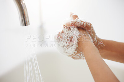 Buy stock photo Woman, tap and washing hands with water or soap for hygiene, disinfection or bacteria and germ removal at home. Closeup of person by faucet, sink or basin with foam for cleanliness, health and safety