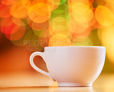 Buy stock photo Bokeh, background and coffee cup for warm drink, fine china or porcelain with crockery, catering and kitchenware. Color, light and ceramic drinkware with breakfast or break time beverage at cafe