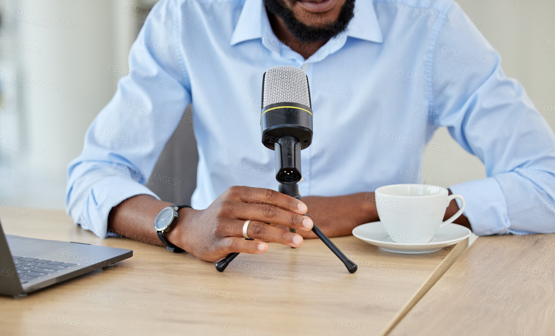 Buy stock photo Influencer and businessman recording a podcast while talking over a microphone for his live streaming talk show. Blogger using audio equipment and doing a live radio broadcast
