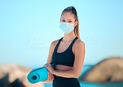 Buy stock photo Face mask, yoga mat or girl at beach for wellness, meditation and morning practice for zen in nature. Balance, spirituality or woman at sea for holistic exercise with mouth cover for Spain compliance