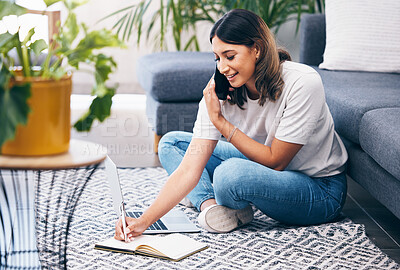 Buy stock photo Woman, phone call and laptop writing notes in the living room by sofa in remote work or studying at home. Female freelancer in conversation or discussion on smartphone, computer and notebook on floor