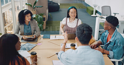 Buy stock photo Meeting, designer team and business people at table planning strategy, brainstorming or discussion in startup office. Collaboration, technology and creative group at desk working on project together