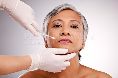 Buy stock photo Plastic surgery hands, woman and injection portrait for facial cosmetics, aesthetic change or medical consultation. Studio PRP, salon face filler and mature patient transformation on white background