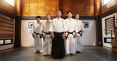Buy stock photo Aikido class, group and portrait for martial arts, sensei or ready for training, gym or contest in dojo. Japanese people, sport or exercise in club, workout or fitness for fight, black belt or battle
