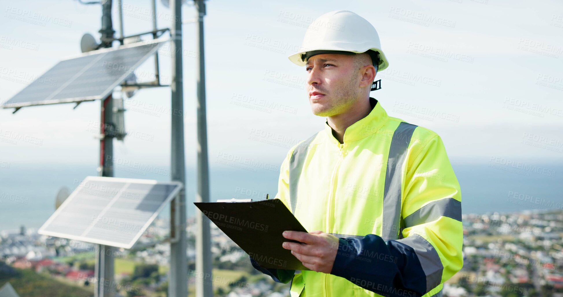 Buy stock photo Man, writing and engineer for solar panel inspection, quality check or alternative energy maintenance on rooftop. Male person, contractor or technician on clipboard for photovoltaic checklist in city