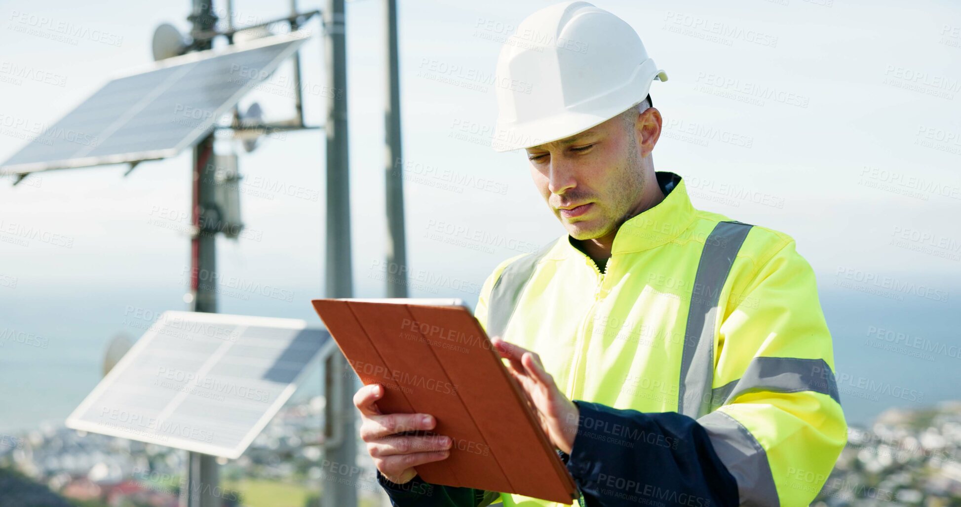 Buy stock photo Man, tablet and engineer for solar panel inspection, research or alternative energy maintenance on rooftop. Male person, contractor or technician on technology for photovoltaic checklist in city