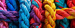 Network, knot and bundle of rope with texture, color and pattern for climbing, safety or strong connection. String, thread or craft yarn on wallpaper with abstract textile, lines or rainbow diversity