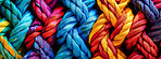 Knot, color and network of rope with pattern, knit and texture for craft, safety or strong connection. String, thread or yarn on wallpaper with abstract textile, creative lines and rainbow diversity