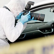 Car, crime scene and forensic photographer with pictures for evidence ...