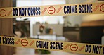 Crime scene, tape and evidence in house for case, inspection and investigation in living room. Apartment, home and lounge with warning from police, forensic and analysis of in flat for justice