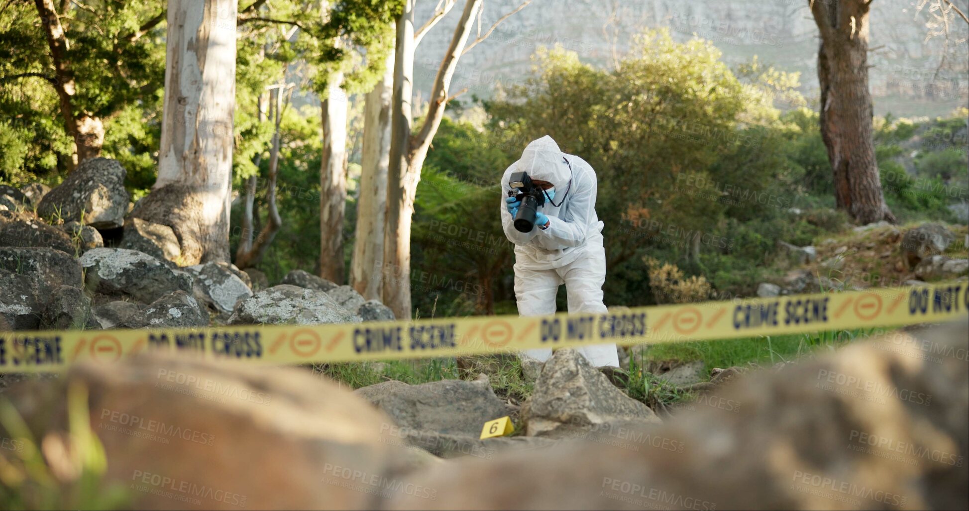 Buy stock photo Forensic, photographer and evidence at crime scene for investigation in forest with police tape and safety hazmat.
Csi quarantine, expert investigator and pictures for observation and case research
