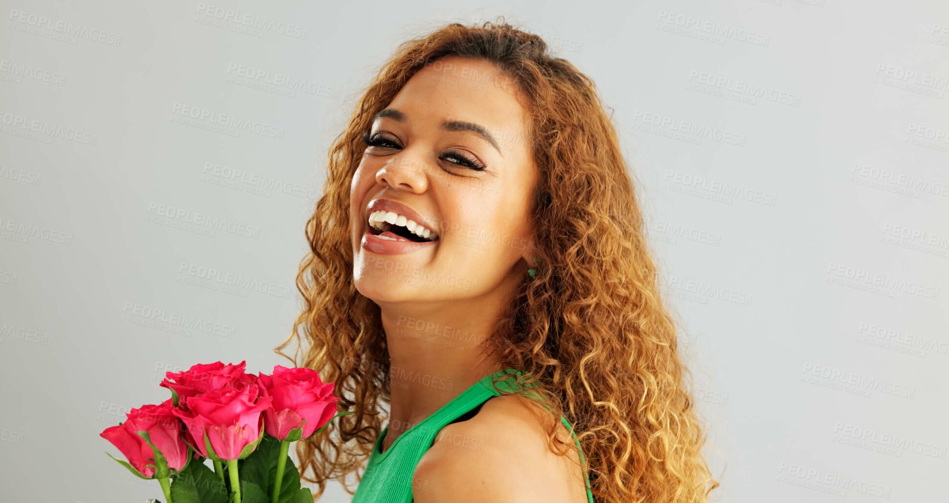 Buy stock photo Happy woman, roses and valentines day with flowers for romance, love or care on a gray studio background. Portrait of female person with smile, bouquet and plant for romantic gift on mockup space