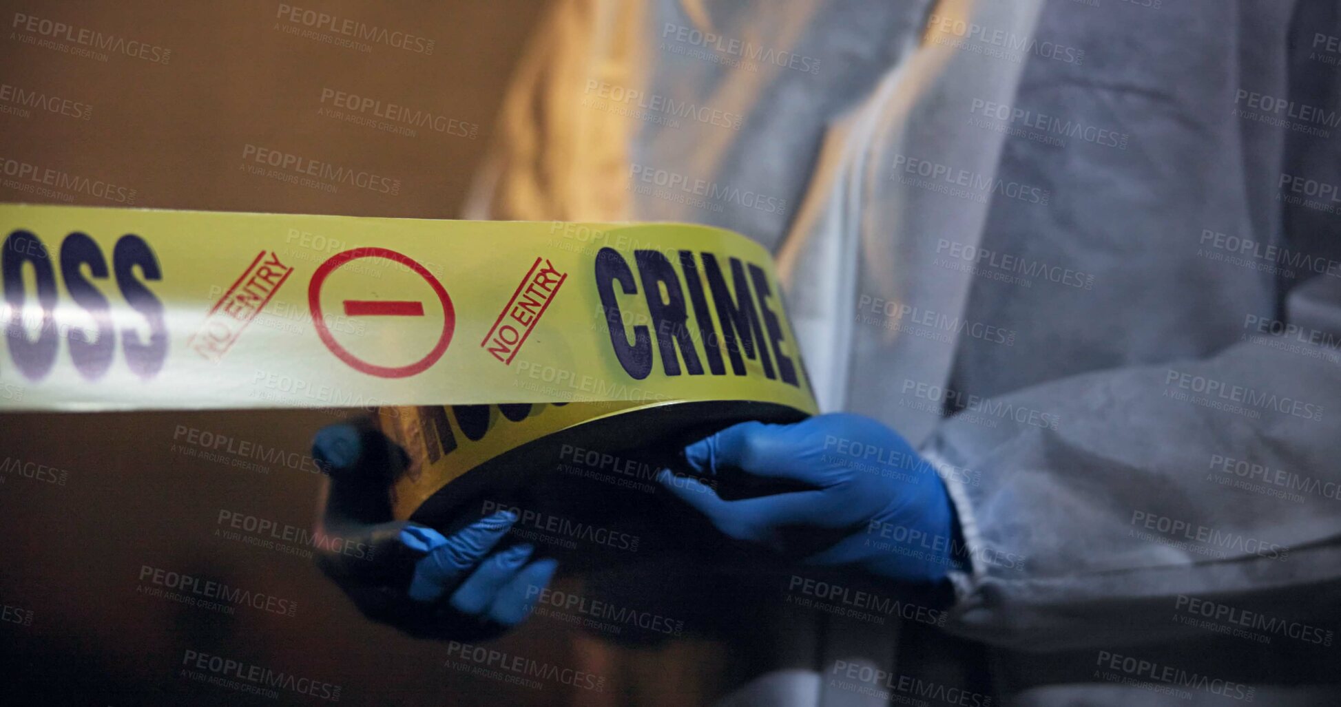 Buy stock photo Police, hands and yellow tape for crime scene, investigation and barricade in night for warning, danger or sign. Forensic inspection, person or detective with security for robbery, murder or no entry