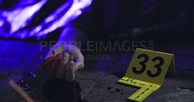 Crime scene, dead body and accident at night in street with police sign and cover with and emergency siren. Death, person or murder or yellow cone in road with lights or blood with accident or corpse