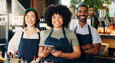 Welcome, restaurant and portrait of team at bar with manager, waiter and waitress at startup with digital app. Bistro, service barman and diversity, happy small business owner at cafe with tablet.
