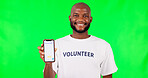 Black man, phone and social media, green screen and volunteer, community service with app and ads on studio background. Website sign up, register for charity work and male person help and nonprofit